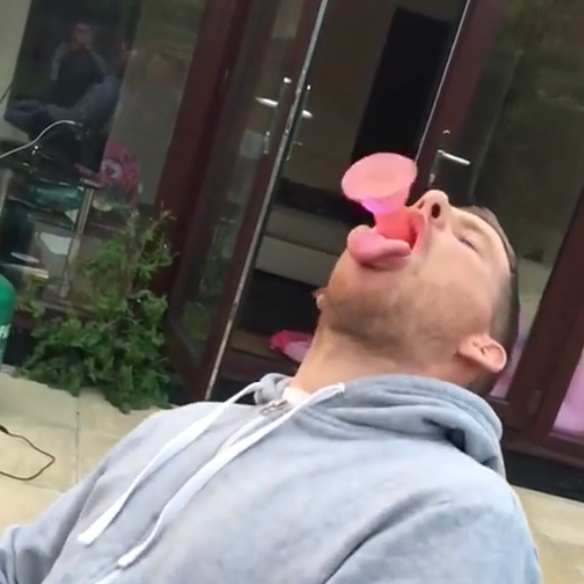 man-catches-dildo-in-mouth-gif